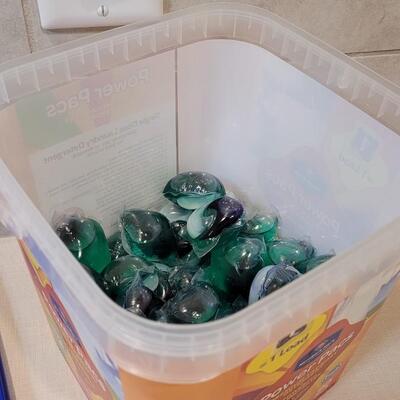 Lot 260: 1/2 Full POWER PACS Laundry Detergent Bucket + New XXL Storage Bag