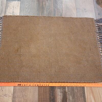 Lot 327: Woven Rug