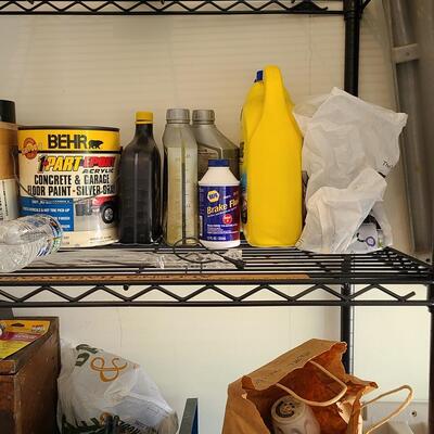 Lot 81: Metal Storage Rack with Garage Supplies 