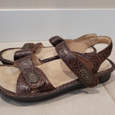 Lot 424: Alegria Brown Tooled Leather with Conchos Sandals Size 38