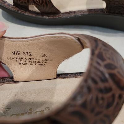 Lot 424: Alegria Brown Tooled Leather with Conchos Sandals Size 38