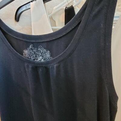Lot 454: Black & White Tank Tops Lot (8)
