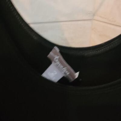 Lot 454: Black & White Tank Tops Lot (8)