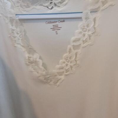 Lot 454: Black & White Tank Tops Lot (8)