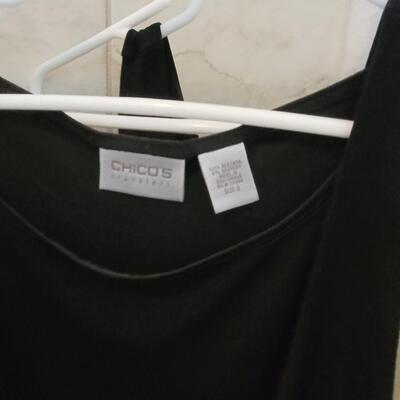 Lot 454: Black & White Tank Tops Lot (8)