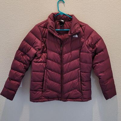 Lot 468: Ladies Northface Puffer Jacket Size Large (color is more purple plum than shows in photos)
