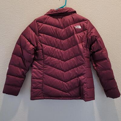 Lot 468: Ladies Northface Puffer Jacket Size Large (color is more purple plum than shows in photos)