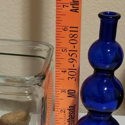 Lot 519: Blue Glass Vase, Clear Glass Container and Green Plastic Vase