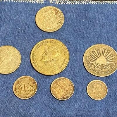 LOT#C74: 7 Silver Foreign Coins Lot