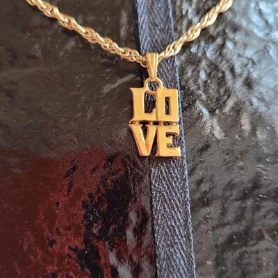 Lot 532: 18" Length ROBERT INDIANA Love Charm 1/20 12k Gold Plated Charm 