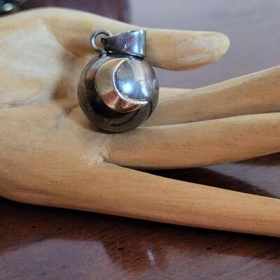 Lot 534: Two Tone Cosmical Moon and Star Harmony Ball Charm