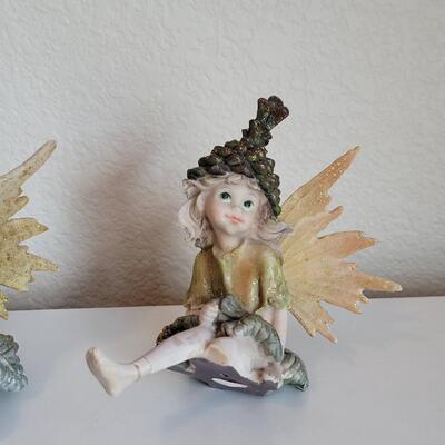 Lot 566: (3) Fairies - one has broken legs