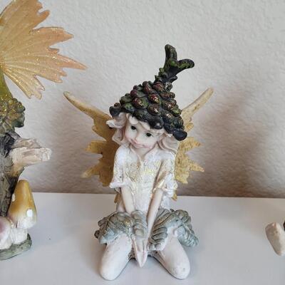 Lot 566: (3) Fairies - one has broken legs