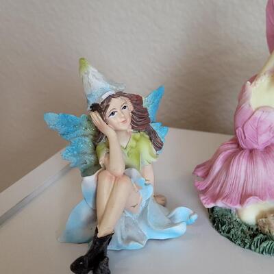 Lot 569: Dancing Fairy and (2) Sitting Fairies