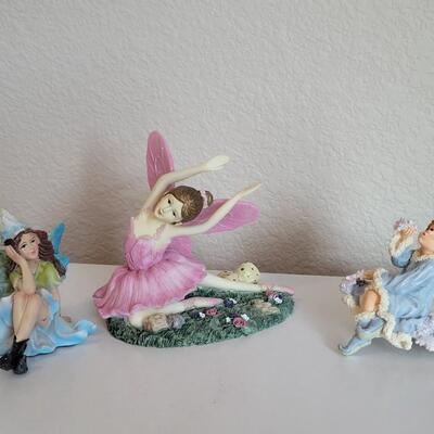 Lot 569: Dancing Fairy and (2) Sitting Fairies