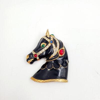 VINTAGE BLACK WITH GOLD TONED ACCENTS ADORNED WITH COLORFUL HARNESS BROOCH