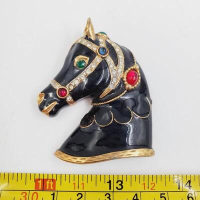 VINTAGE BLACK WITH GOLD TONED ACCENTS ADORNED WITH COLORFUL HARNESS BROOCH