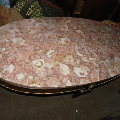 Oval 34 in. Pink French Marble Coffee table.