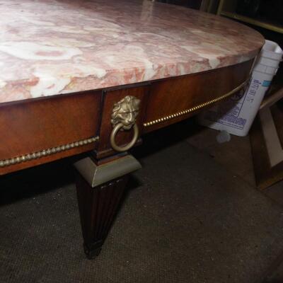 Oval 34 in. Pink French Marble Coffee table.