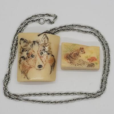 Lot J19 - Handcrafted etched bone Collie pendant on a 24