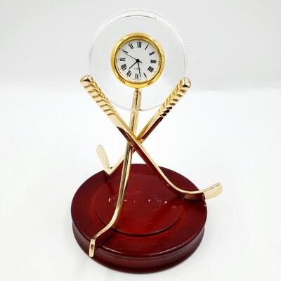 HOCKEY PUCK CRYSTAL CLOCK WITH HOCKEY STICK STAND AND WOODEN BASE