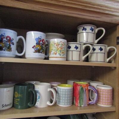 Several Cabinets Full of Misc. Kitchenware- Drinking Glasses, Mugs, Plates, Bowls, Etc.
