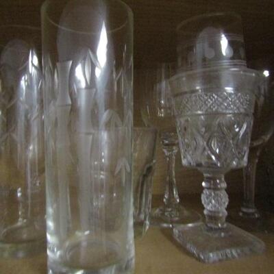 Several Cabinets Full of Misc. Kitchenware- Drinking Glasses, Mugs, Plates, Bowls, Etc.
