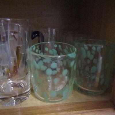 Several Cabinets Full of Misc. Kitchenware- Drinking Glasses, Mugs, Plates, Bowls, Etc.