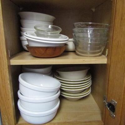 Several Cabinets Full of Misc. Kitchenware- Drinking Glasses, Mugs, Plates, Bowls, Etc.