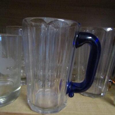 Several Cabinets Full of Misc. Kitchenware- Drinking Glasses, Mugs, Plates, Bowls, Etc.