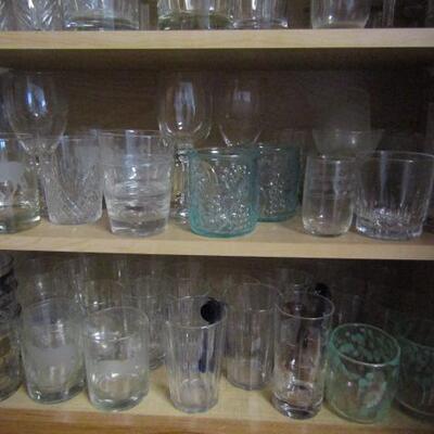 Several Cabinets Full of Misc. Kitchenware- Drinking Glasses, Mugs, Plates, Bowls, Etc.