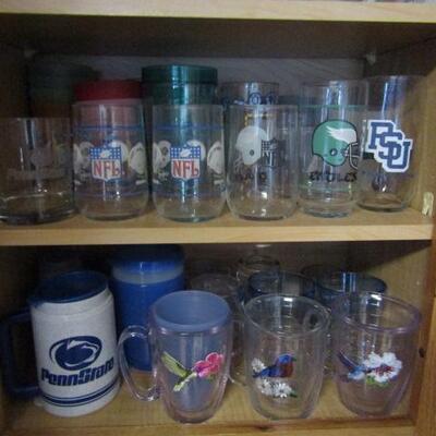 Cabinet Full of Mostly Sports Related Drinkware and Accessories