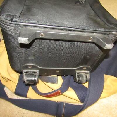 LOT 69  TWO SUITCASES ON WHEELS, DUFFLE BAG & MORE