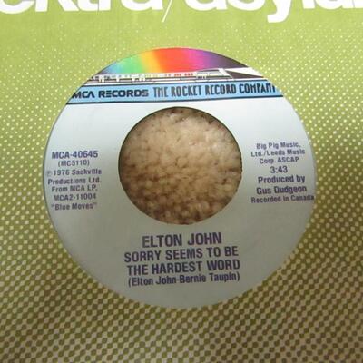 LOT 46  VINYL 45's RECORDS INCLUDING ELTON JOHN