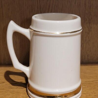 Lot 5: University of Wyoming Mug (Has been used for cleaning paint brushes)