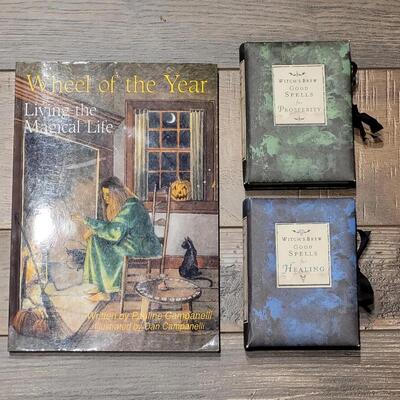 Lot 83: Wheel of the Year Book and Witch's Brew Good Spells Books 