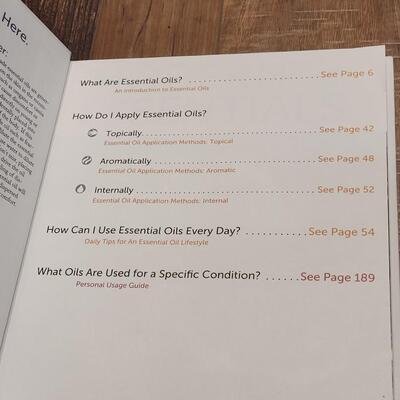 Lot 102: Essential Oil Book and Containers Lot