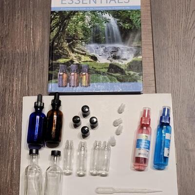 Lot 102: Essential Oil Book and Containers Lot