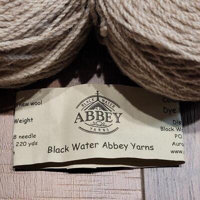Lot 114: (2) Black Water Abbey Yarns - Oatmeal Colored