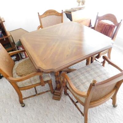 Vintage Solid Wood Table with Four Cane Back Chairs