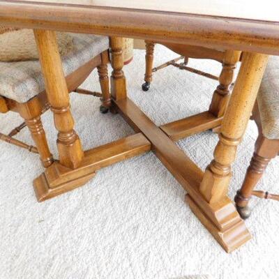 Vintage Solid Wood Table with Four Cane Back Chairs
