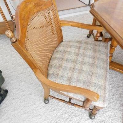 Vintage Solid Wood Table with Four Cane Back Chairs