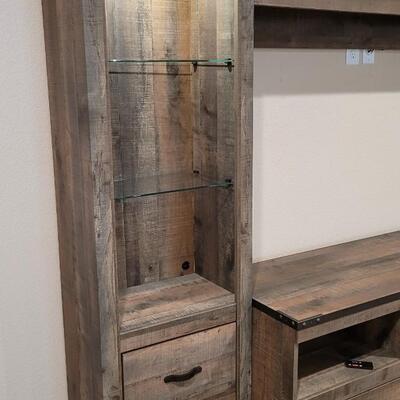 Lot 184: ASHLEY FURNITURE Entertainment Center w/ Fireplace Feature (4 Pieces All Come Apart)