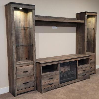 Lot 184: ASHLEY FURNITURE Entertainment Center w/ Fireplace Feature (4 Pieces All Come Apart)
