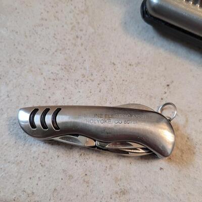Lot 214: (2) Wallets and Small Pocket knife 