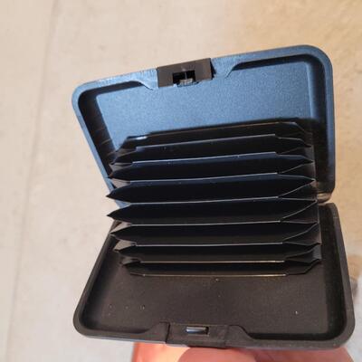 Lot 214: (2) Wallets and Small Pocket knife 
