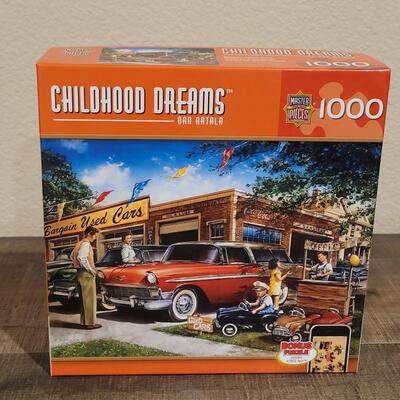 Lot 218: 1000 pieces Childhood Dreams Puzzles 
