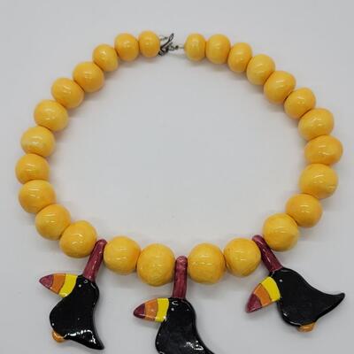 Lot J37 - Handcrafted ceramic beaded Necklace. Handmade Toucan charms in between.