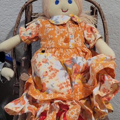 Lot 273: Cornelloki Dolls and Wood Chair