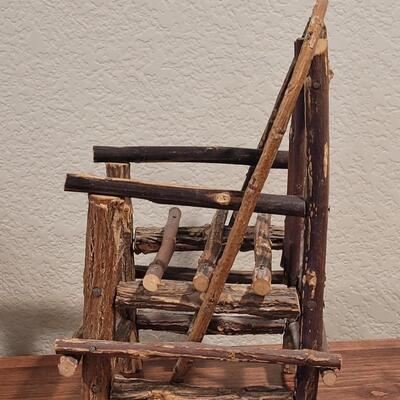 Lot 273: Cornelloki Dolls and Wood Chair